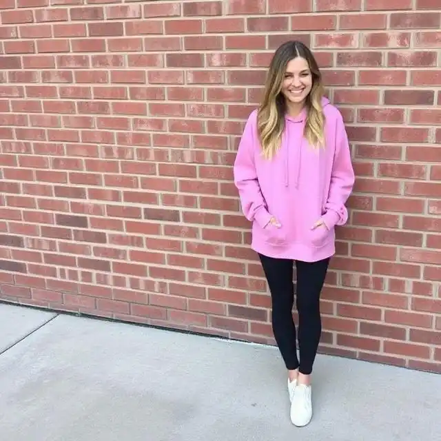 Cozy oversized hoodie paired with leggings for a stylish and comfortable loungewear look.